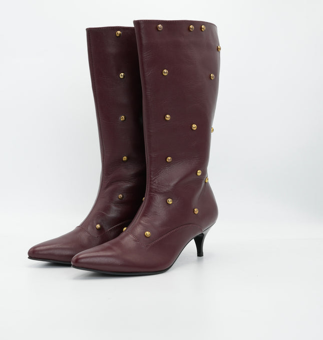 Bota tacón punta en cuero vino tinto