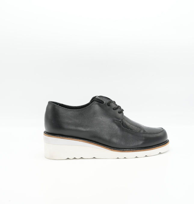 Zapato en cuero negro