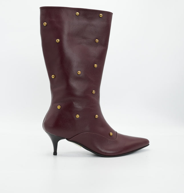 Bota tacón punta en cuero vino tinto
