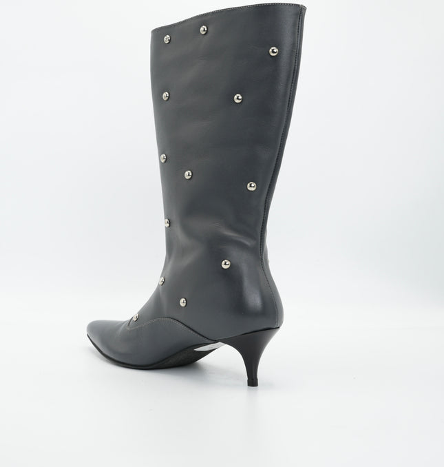 Bota tacón en cuero  punta negro