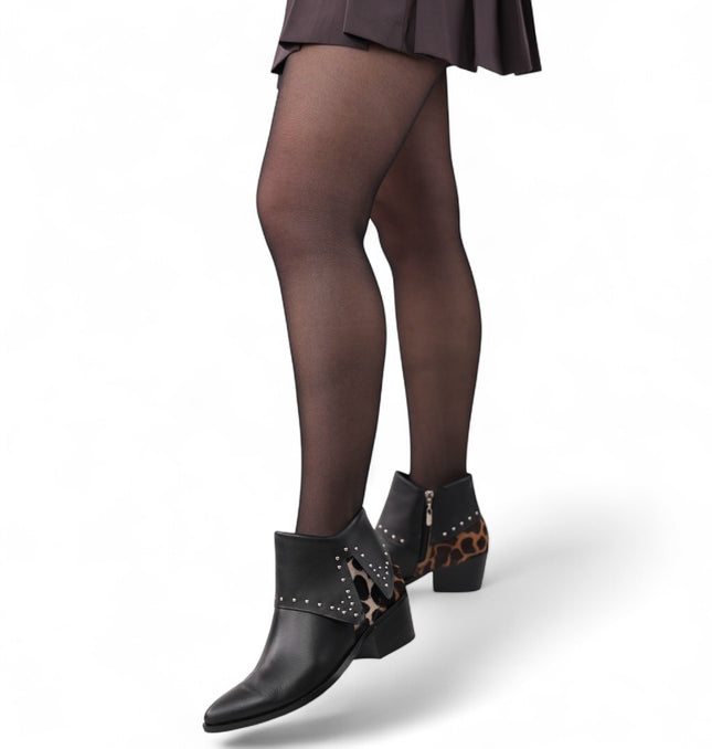 Botin negro con talon de piel